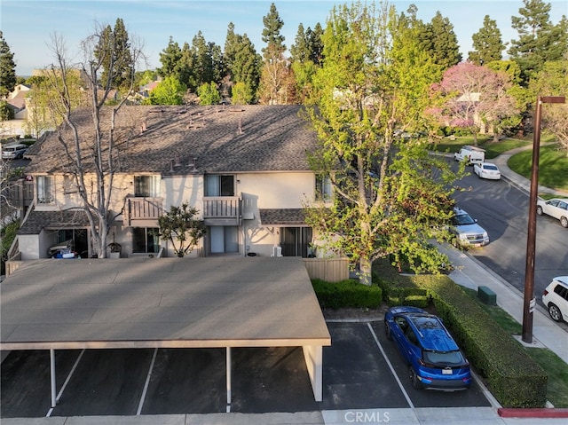 81 Smokestone Unit 12, Irvine, CA 92614 - view of property with uncovered parking