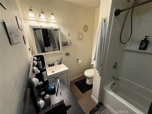 full bathroom with tile patterned flooring, vanity, tiled shower / bath combo, and toilet