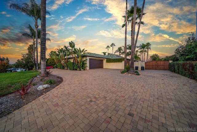 view of front of property with a garage