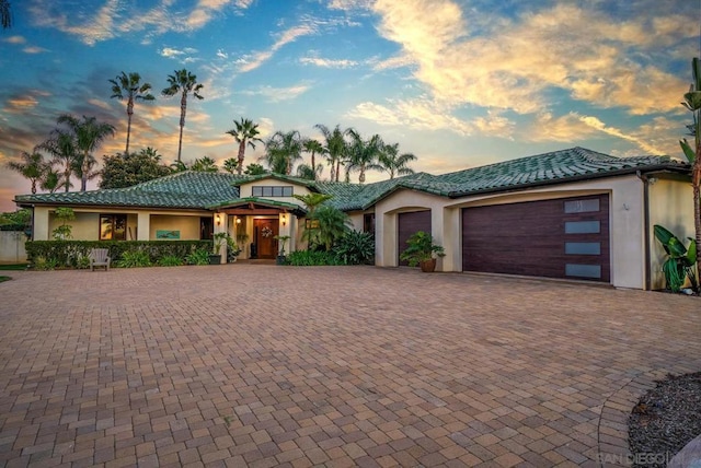 view of front of property with a garage