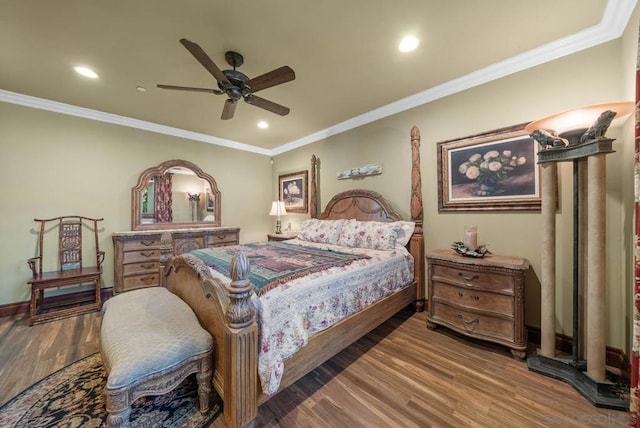 bedroom with hardwood / wood-style floors, ceiling fan, and crown molding