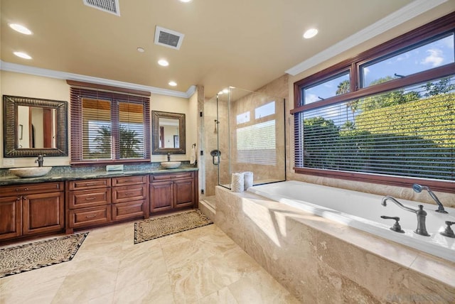 bathroom with shower with separate bathtub, vanity, plenty of natural light, and ornamental molding