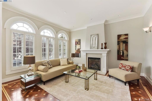 living room featuring plenty of natural light and crown molding