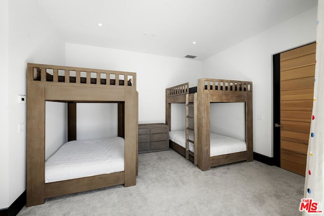 unfurnished bedroom featuring light colored carpet