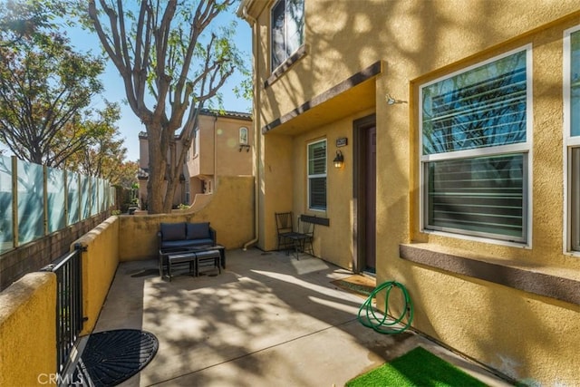 view of patio / terrace with a balcony