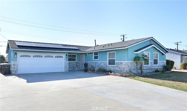 8121 San Mateo Cir, Buena Park, CA 90620 - view of front of home featuring solar panels and a garage