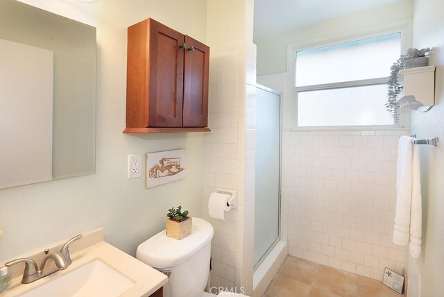 8121 San Mateo Cir, Buena Park, CA 90620 - bathroom with toilet, vanity, tile patterned floors, and walk in shower