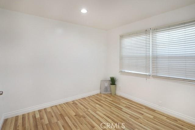 8121 San Mateo Cir, Buena Park, CA 90620 - spare room featuring baseboards, light wood-style flooring, and recessed lighting