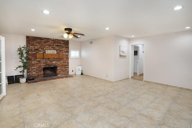 8121 San Mateo Cir, Buena Park, CA 90620 - unfurnished living room featuring ceiling fan and a fireplace