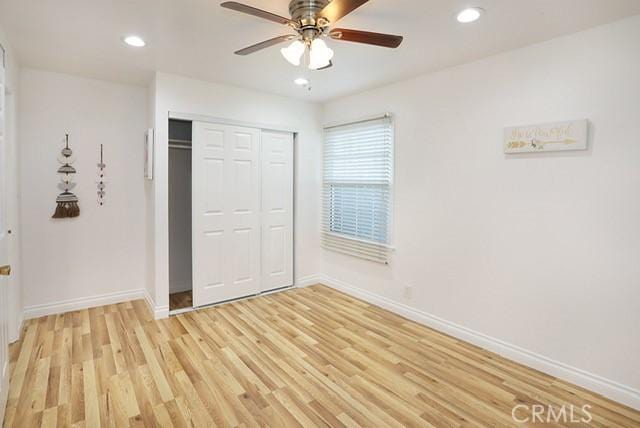 8121 San Mateo Cir, Buena Park, CA 90620 - unfurnished bedroom featuring ceiling fan, a closet, and light wood-type flooring
