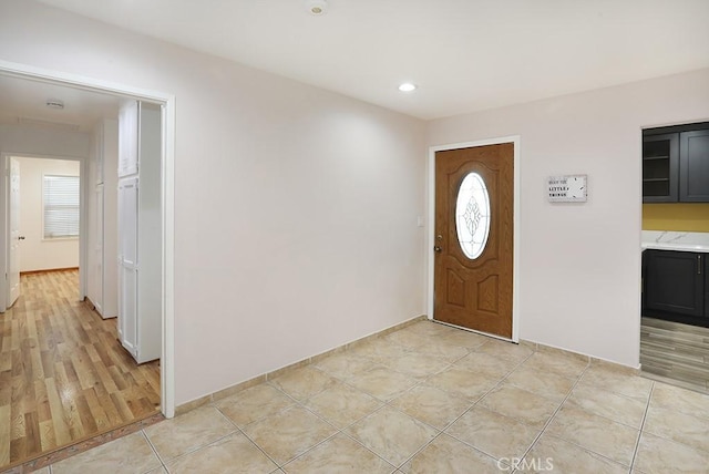 8121 San Mateo Cir, Buena Park, CA 90620 - foyer entrance featuring plenty of natural light and light hardwood / wood-style floors