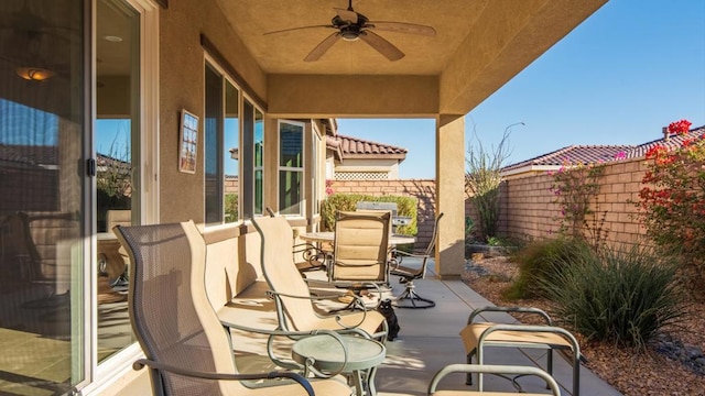 view of patio with ceiling fan