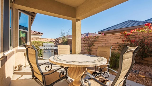 view of patio / terrace with a grill