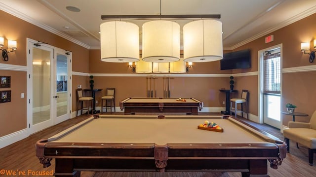 game room with hardwood / wood-style floors, a healthy amount of sunlight, and pool table