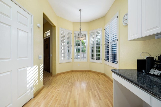 dining space featuring light hardwood / wood-style floors