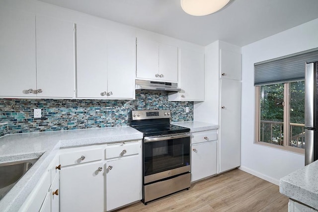 kitchen with white cabinetry, sink, light hardwood / wood-style flooring, backsplash, and stainless steel range with electric cooktop