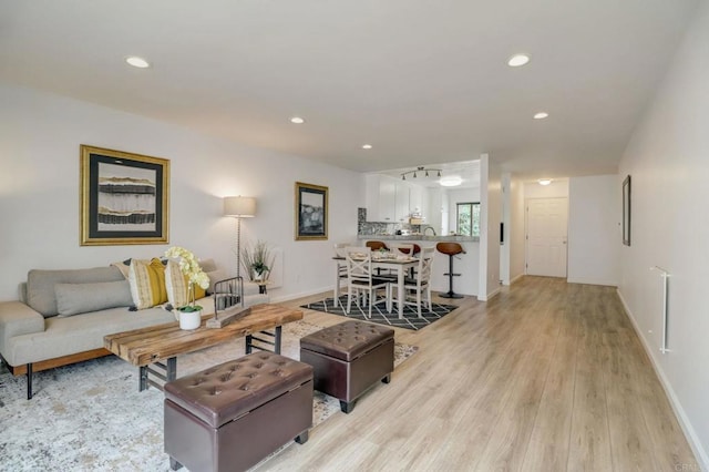 living room featuring light wood-type flooring