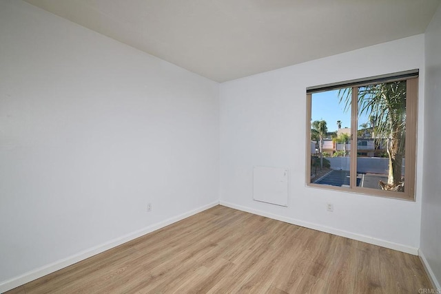 empty room with light wood-type flooring