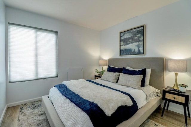 bedroom featuring hardwood / wood-style floors