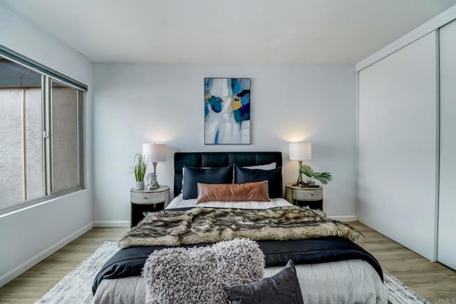 bedroom featuring light hardwood / wood-style floors