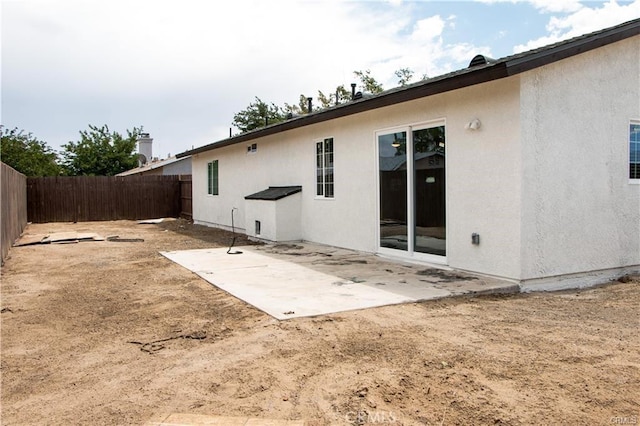 back of house featuring a patio area