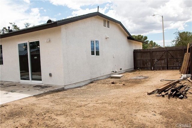 view of home's exterior featuring a patio