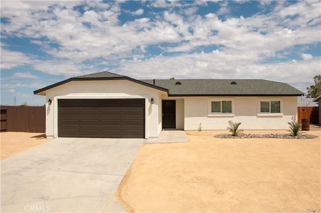 single story home featuring a garage