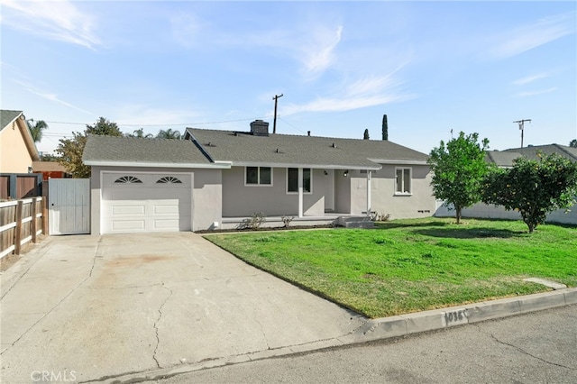 single story home with a front yard and a garage