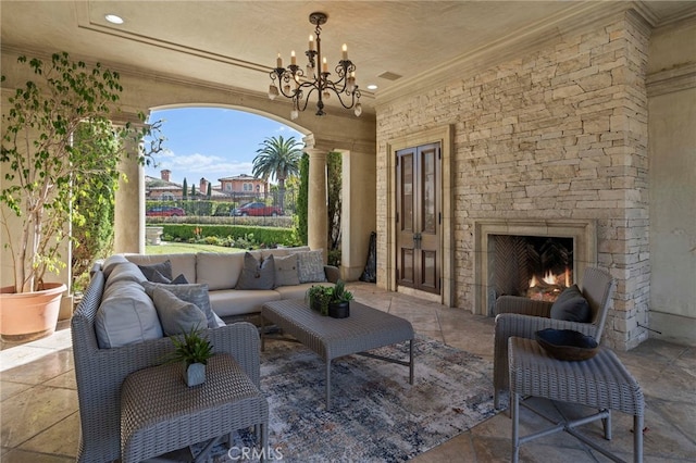 view of patio / terrace featuring an outdoor living space with a fireplace