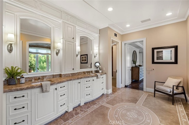 7 Shoreview, Newport Coast, CA 92657 - bathroom featuring double vanity, ornamental molding, recessed lighting, and inlaid floor details