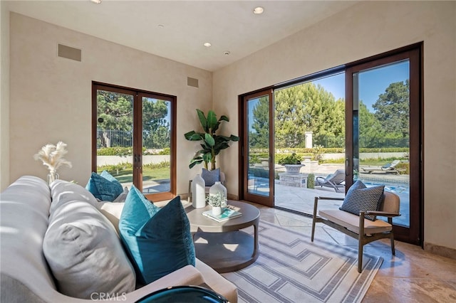 7 Shoreview, Newport Coast, CA 92657 - living room featuring recessed lighting and french doors