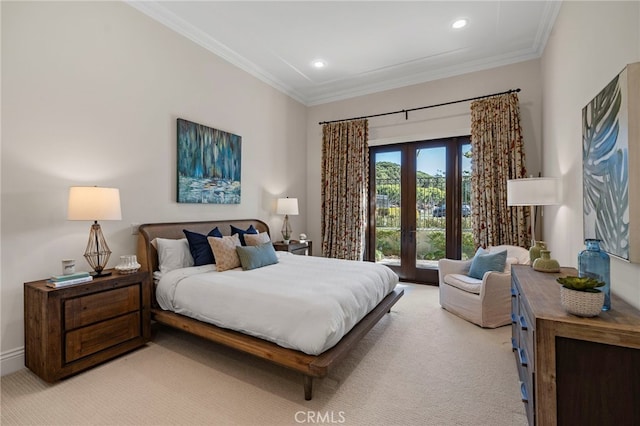 carpeted bedroom with french doors and ornamental molding