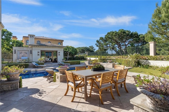 view of patio featuring a fenced in pool