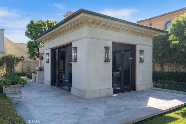 exterior space with a patio