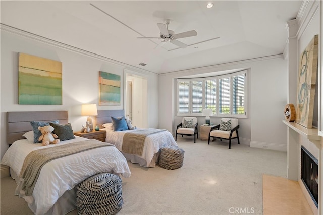 carpeted bedroom with vaulted ceiling and ceiling fan