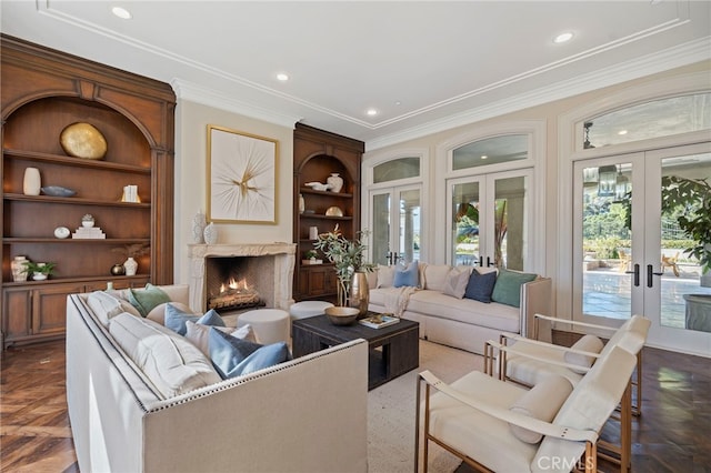 interior space featuring built in shelves, ornamental molding, and french doors