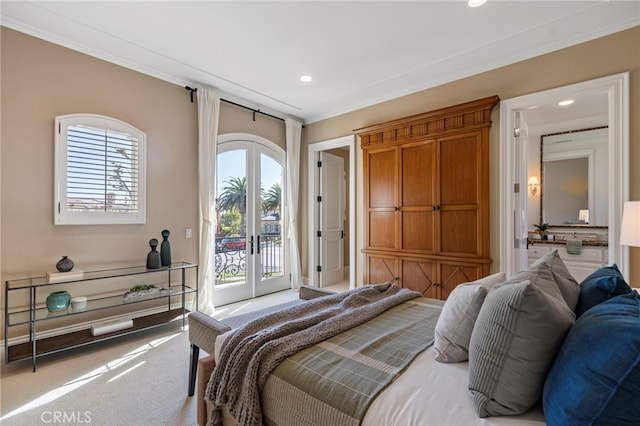 carpeted bedroom featuring access to exterior, crown molding, and french doors