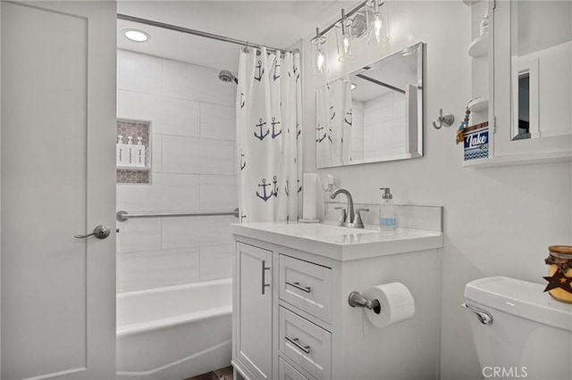 full bathroom featuring toilet, shower / tub combo, and vanity