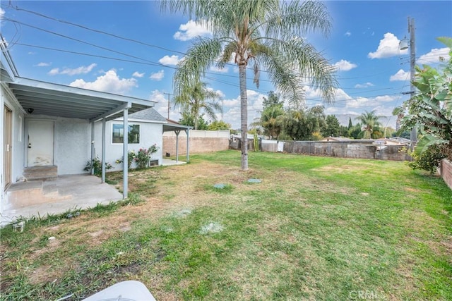 view of yard with a patio area