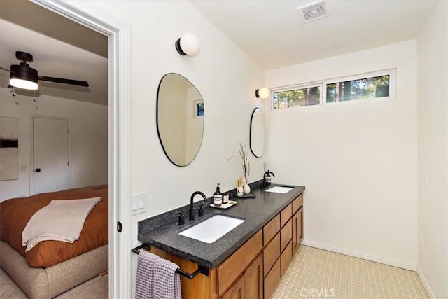 bathroom featuring vanity and ceiling fan