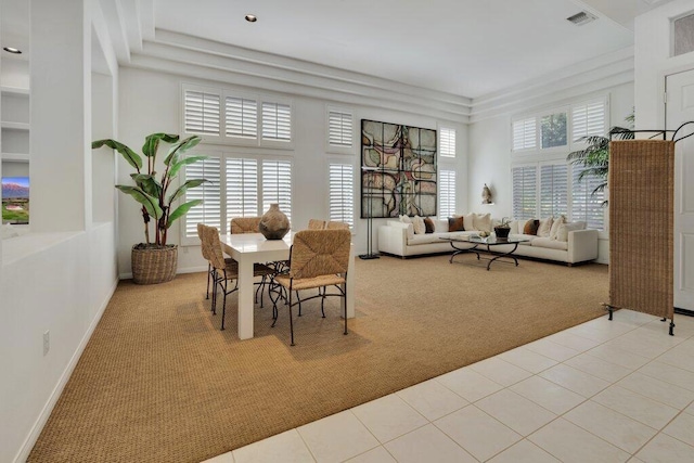 view of carpeted dining space