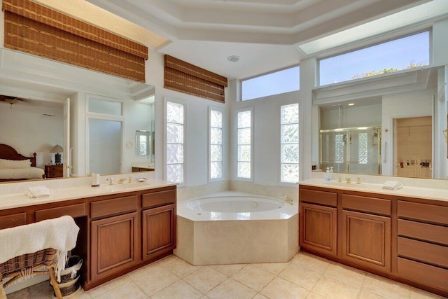 bathroom with independent shower and bath, tile patterned flooring, and vanity