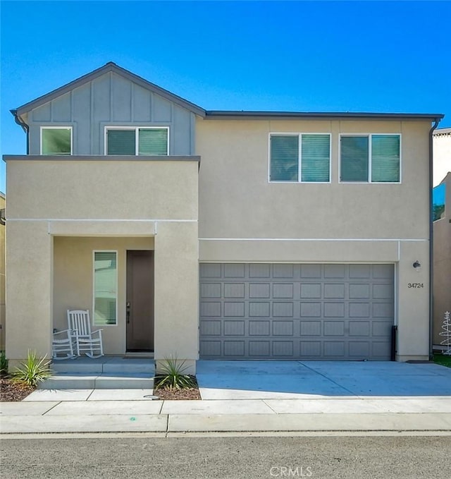 view of front of property featuring a garage