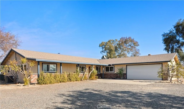 single story home with a garage