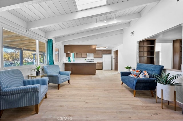 living room featuring vaulted ceiling with beams, wood ceiling, and light hardwood / wood-style flooring