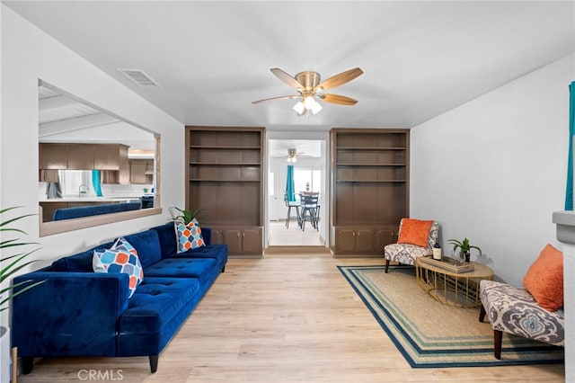 living room with light hardwood / wood-style floors