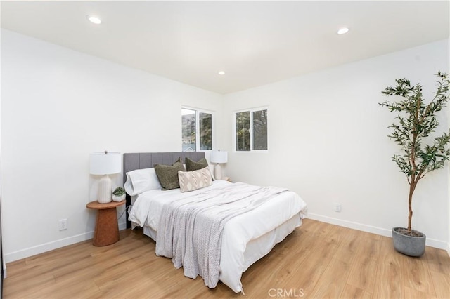 bedroom featuring light hardwood / wood-style floors