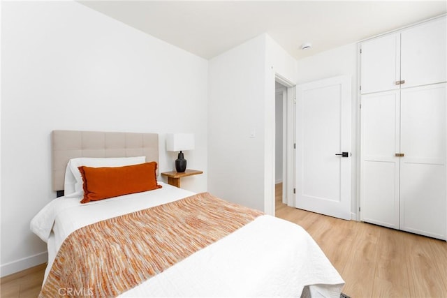 bedroom featuring light wood-type flooring