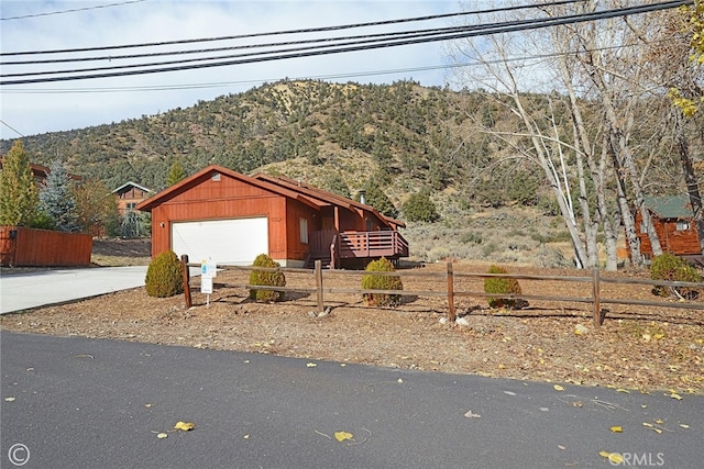 view of front facade featuring a mountain view