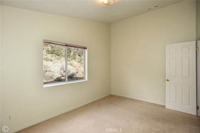 view of carpeted spare room